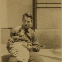 One of the men with a baby